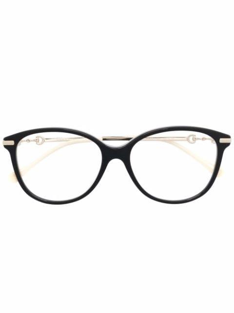 round-frame clear glasses by GUCCI