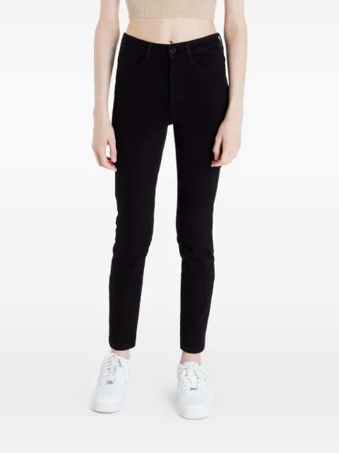Reborn logo-plaque jeans by GUESS USA
