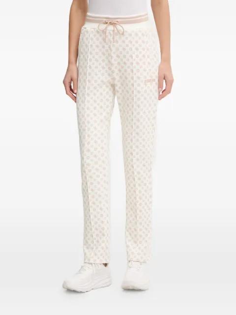 Scuba patterned track pants by GUESS USA