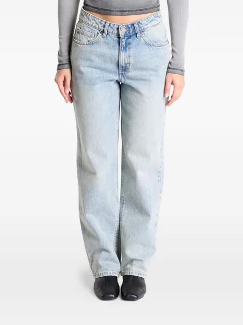 acid-wash jeans by GUESS USA