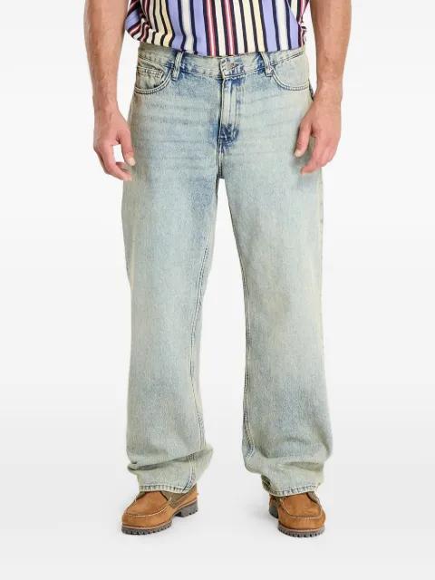 acid-wash jeans by GUESS USA