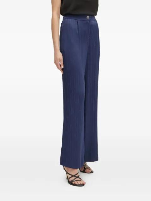 button-fastening pattern trousers by GUESS USA