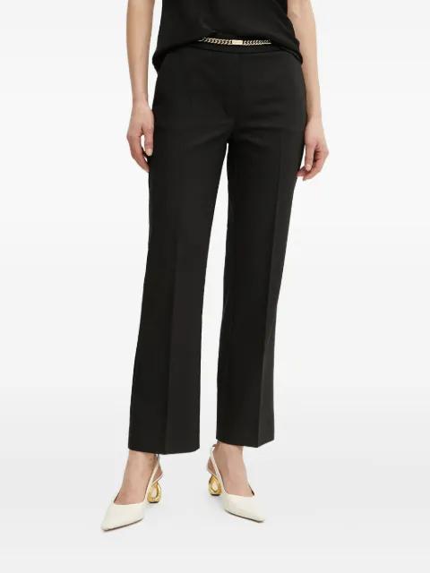 chain-detail trousers by GUESS USA
