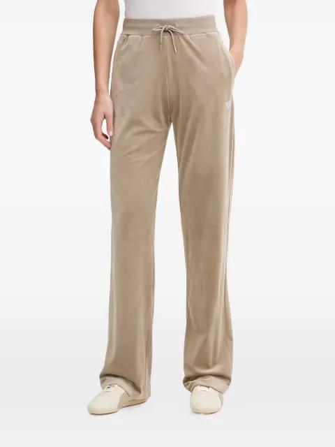 embellished-logo track pants by GUESS USA