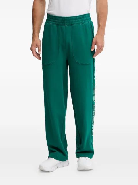 logo-detail panelled trousers by GUESS USA