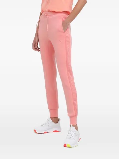 logo-embossed track pants by GUESS USA