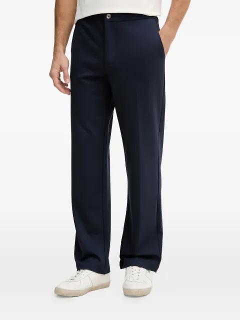 logo-plaque tailored trousers by GUESS USA