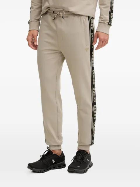 logo-tape track pants by GUESS USA