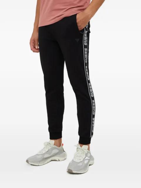 logo-tape track pants by GUESS USA