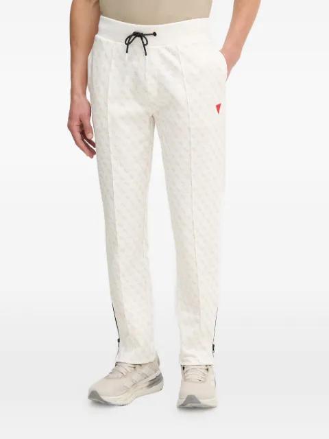 patterned track pants by GUESS USA