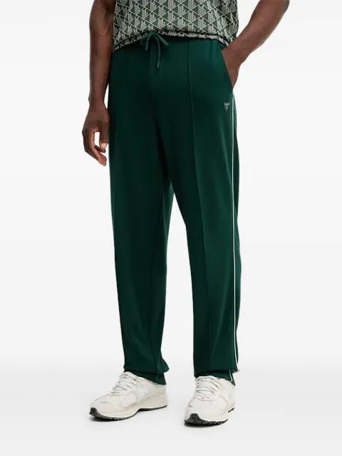 side-piping track pants by GUESS USA