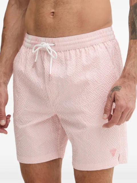striped seersucker swim shorts by GUESS USA