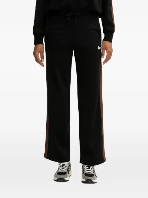 striped track pants by GUESS USA