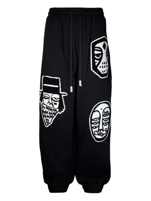 Parachute appliqué track pants by HACULLA