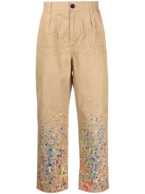 cotton paint-splatter trousers by HACULLA