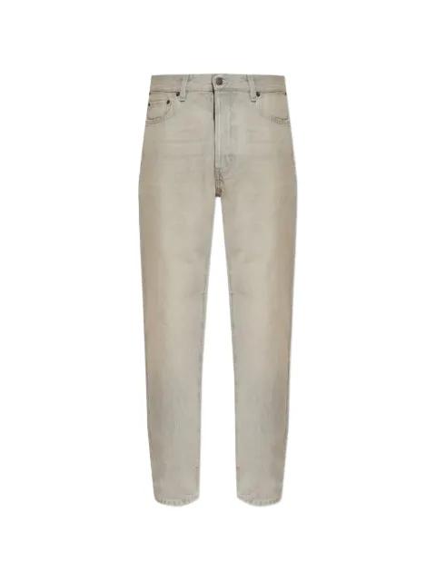 faded-wash jeans by HAIKURE