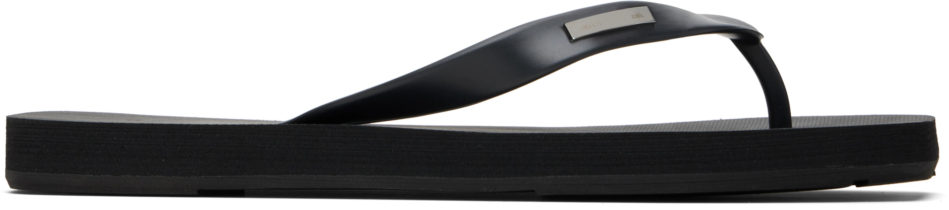 Black 'HE' Flip-Flops by HELIOT EMIL
