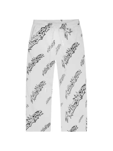 graffiti-print track pants by HELLSTAR
