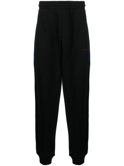 logo-embroidered cotton track pants by HELMUT LANG