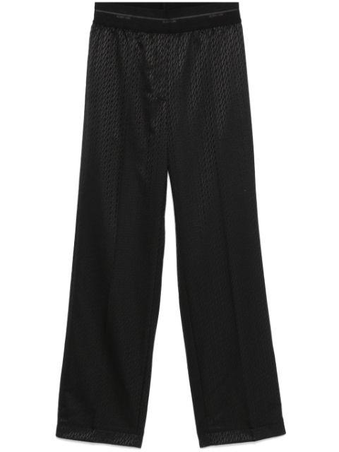 logo-jacquard trousers by HELMUT LANG