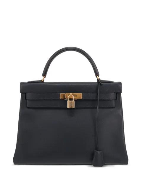 1997 Gilt leather handbag by HERMES 