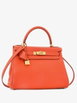 Kelly Handbag Orange Clemence with Gold Hardware 28 satchel by HERMES Kelly Handbag Orange Clemence with Gold Hardware 28 satchel by HERMES