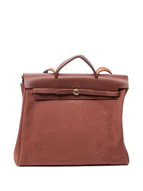 leather-trimmed shoulder bag by HERMES 