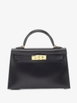 mini Kelly two-way handbag by HERMES 