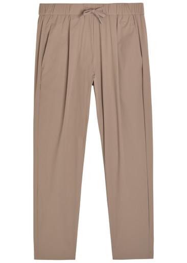 Tapered-leg stretch-shell trousers by HERNO