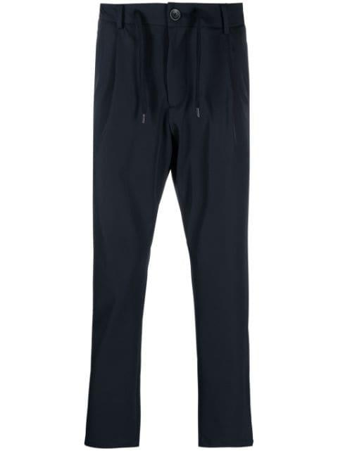 logo-plaque button-fastening tapered trousers by HERNO