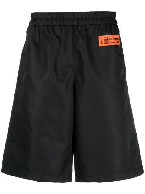 Ex-Ray logo-patch shorts by HERON PRESTON