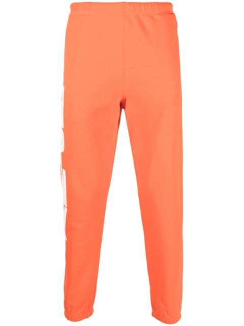 HPNY-print tapered track pants by HERON PRESTON