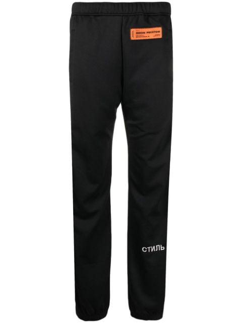 logo patch ruched-ankle trousers by HERON PRESTON