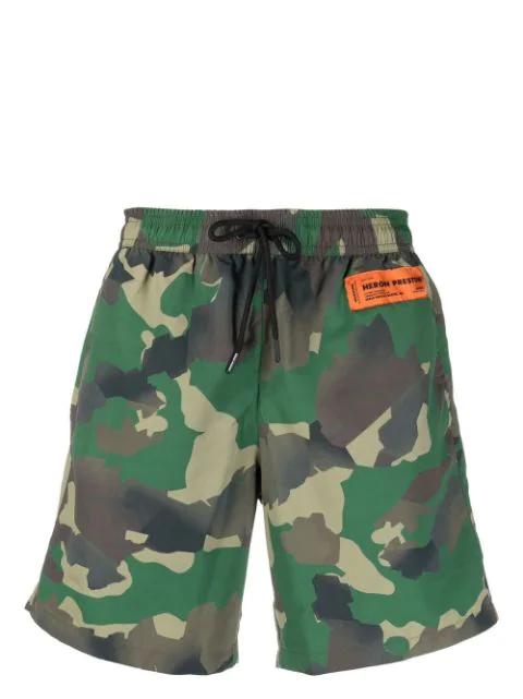 logo-patch swim shorts by HERON PRESTON