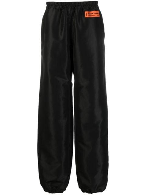 logo-patch wide-leg trousers by HERON PRESTON