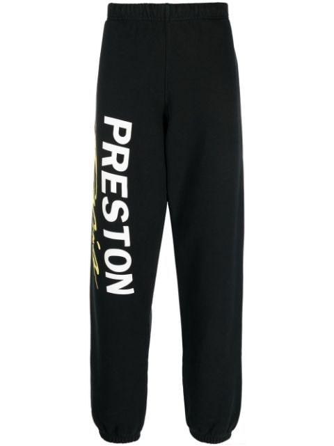 logo-print organic cotton track pants by HERON PRESTON