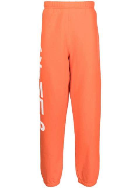 СТИЛЬ logo-print track pant by HERON PRESTON