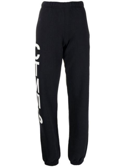 СТИЛЬ logo-print track pants by HERON PRESTON