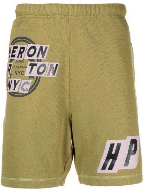 logo-print track shorts by HERON PRESTON