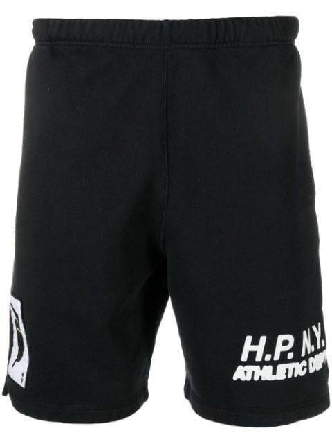 slogan-print cotton shorts by HERON PRESTON
