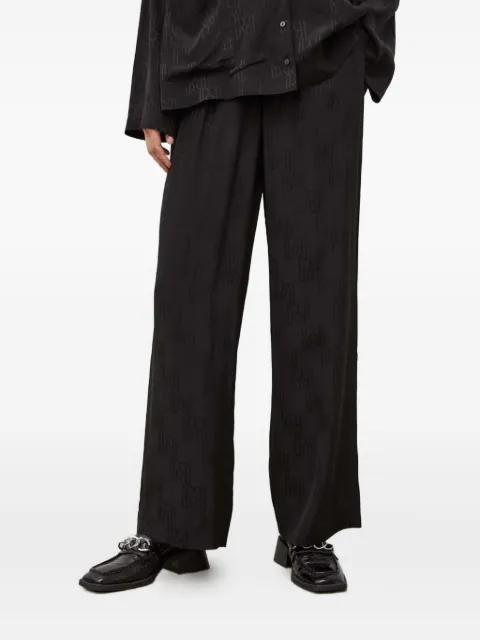 monogram-pattern trousers by HERSKIND
