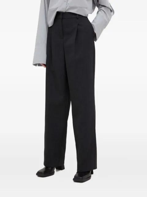 pleated belt-loops trousers by HERSKIND