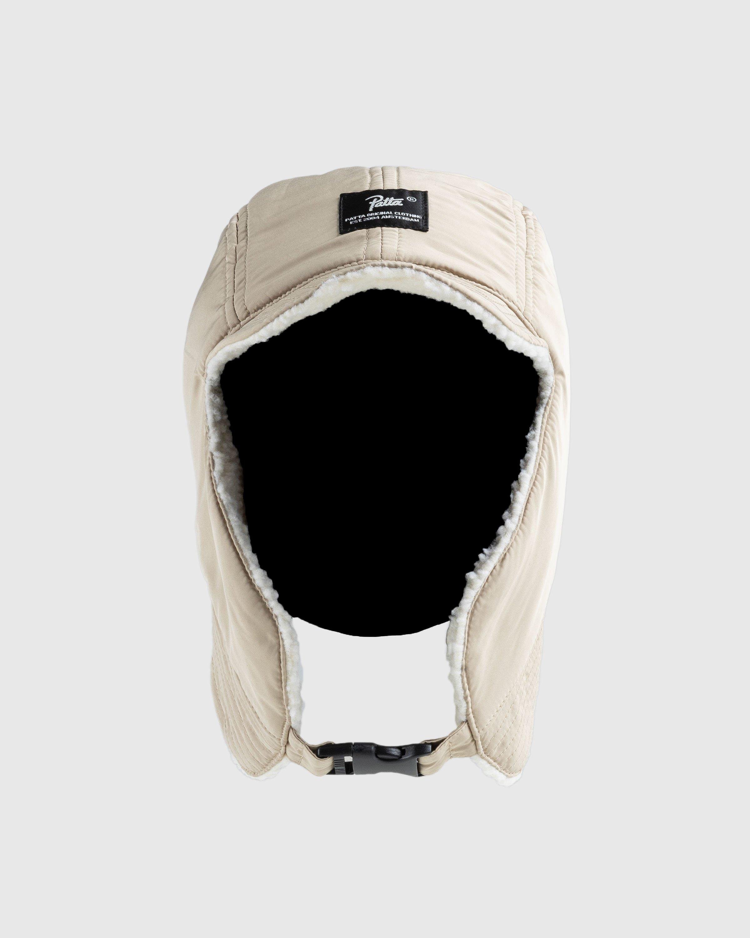 PattaReversible Flap Cap White by HIGHSNOBIETY