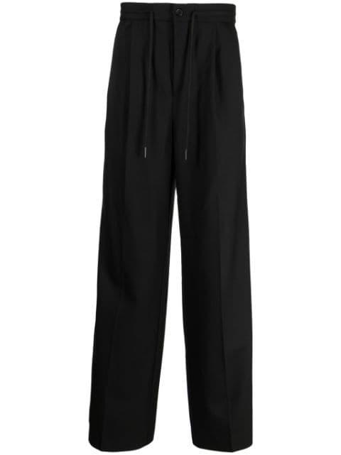 pressed-crease tailored trousers by HOLZWEILER