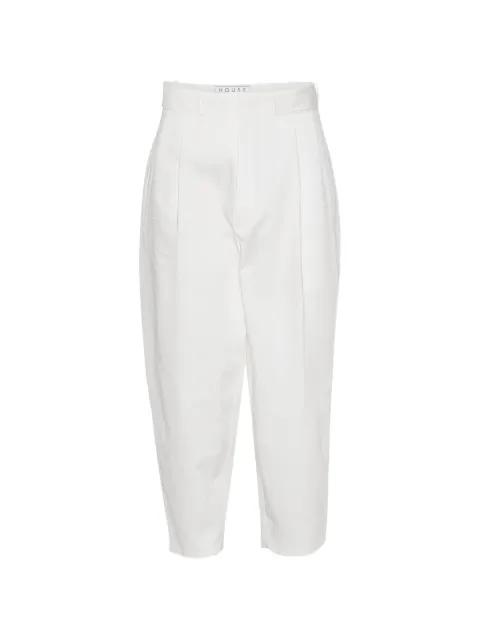 Jonas pleated cotton trousers by HOUSE OF THE VERY ISLANDS