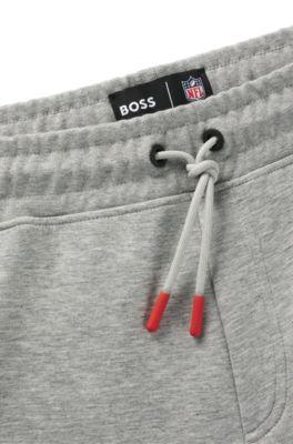 BOSS x NFL signature-tape tracksuit bottoms with special branding by HUGO BOSS