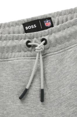 BOSS x NFL signature-tape tracksuit bottoms with special branding by HUGO BOSS