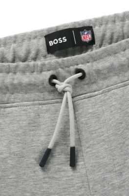 BOSS x NFL signature-tape tracksuit bottoms with special branding by HUGO BOSS