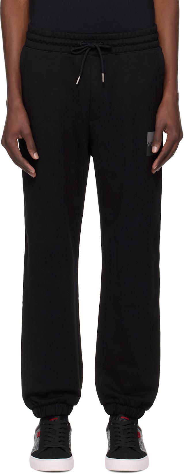 Black Cotton Terry Split Logo Sweatpants by HUGO BOSS