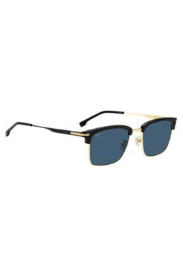 Blue-lens sunglasses with black and gold-tone frames by HUGO BOSS Blue-lens sunglasses with black and gold-tone frames by HUGO BOSS